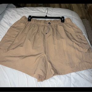 Nike women’s Tan Athletic Shorts